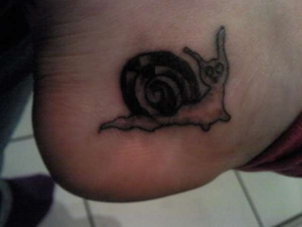 Black And Grey Simple Snail Tattoo On Foot