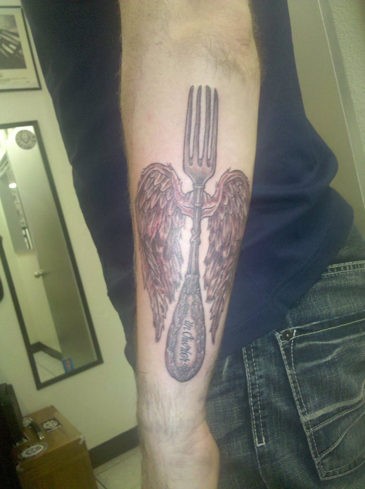 Black And Grey Vintage Fork Having Angel Wings Tattoo On Arm Sleeve