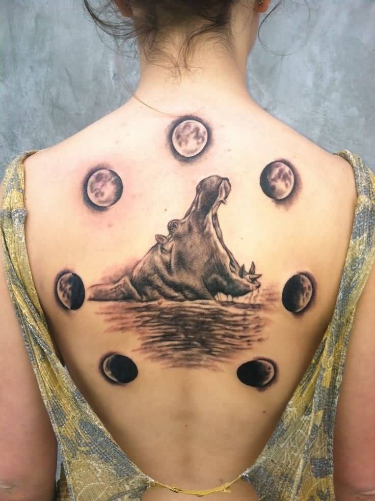 Black And White Hippo Opening Mouth In Water And Moon Phases Tattoo On Upper Back