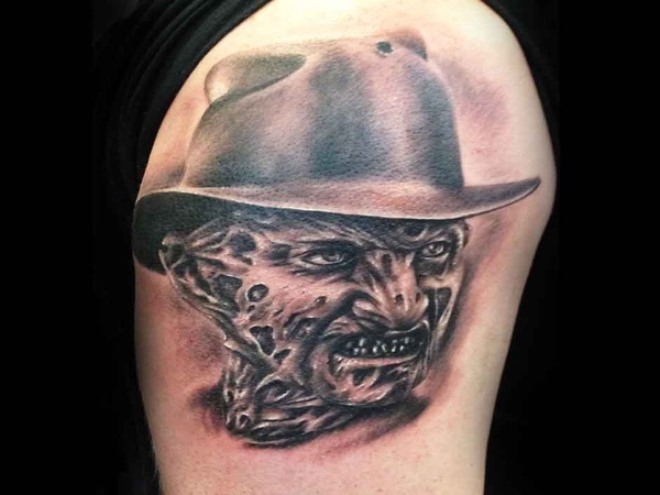 Black Ink Grinning Freddy Krueger Tattoo