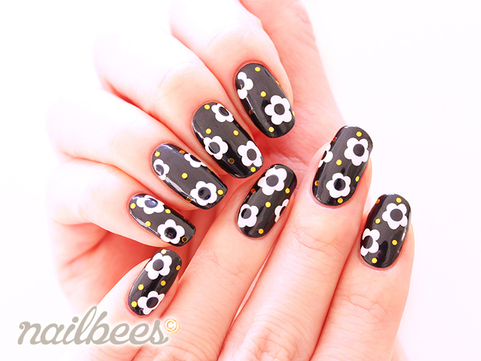Black Nails With White Flowers Winter Nail Art