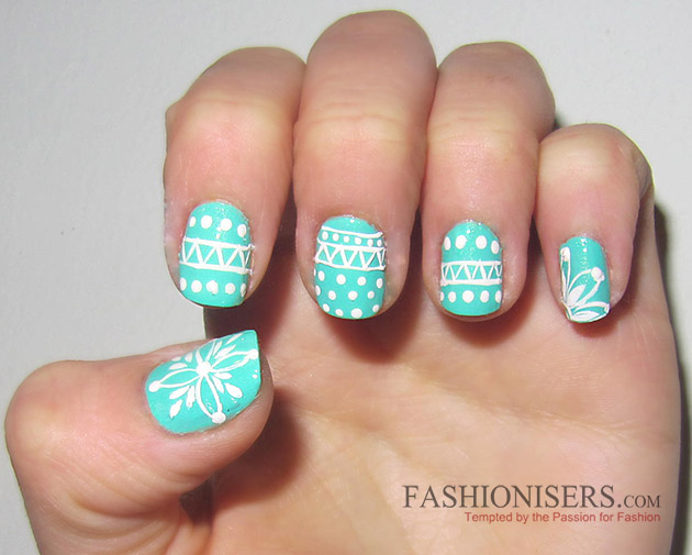 Blue Base Nails With White Design Winter Nail Art