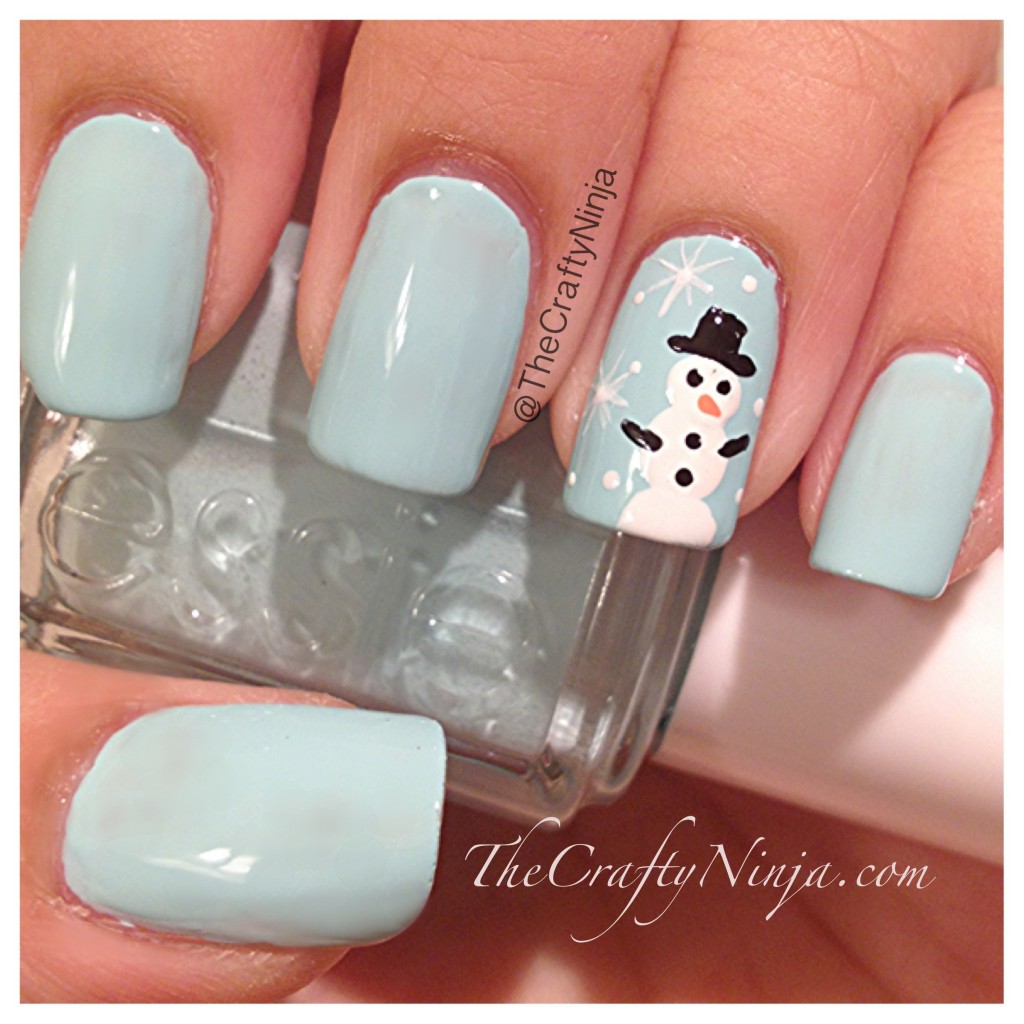 Blue Nails With Snowman Design Winter Nail Art