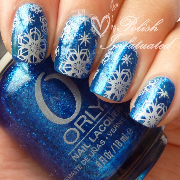 Blue Nails With White Snowflakes Design Winter Nail Art