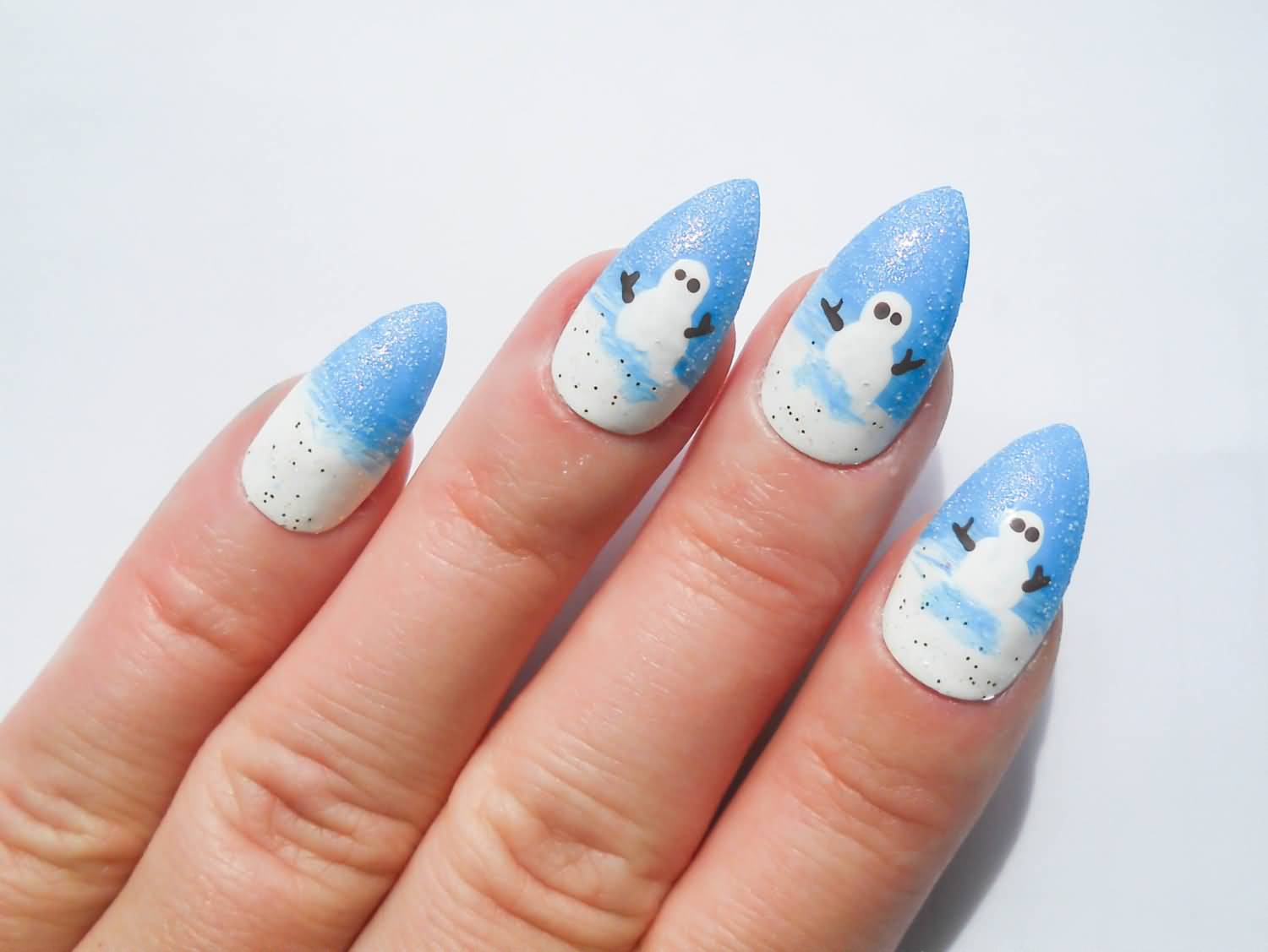 Blue Stiletto Nails With Snowman Design Winter Nail Art