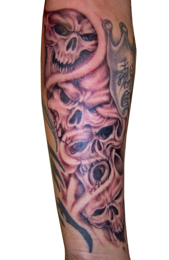 Brilliant Grey Evil Skulls Tattoo On Forearm