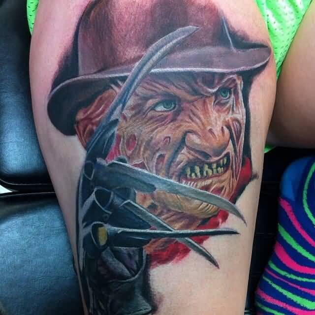 Colorful Angry Freddy Krueger Portrait Tattoo On Thigh By Stephen