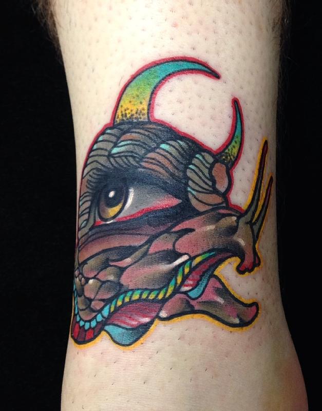 Colorful Eye On Snail Shell Traditional Tattoo By Gary Dunn