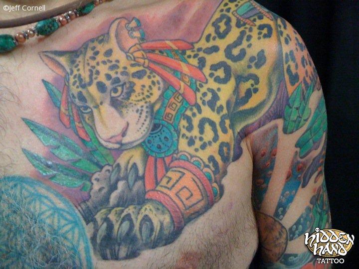 Colorful Jaguar With Aztec Style Adornments Tattoo On Chest