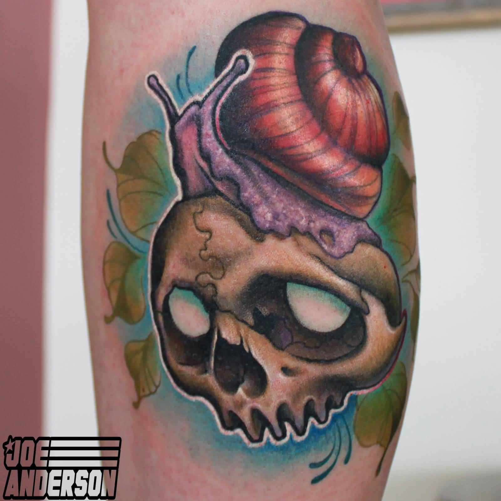 Colorful Snail On Skull Tattoo