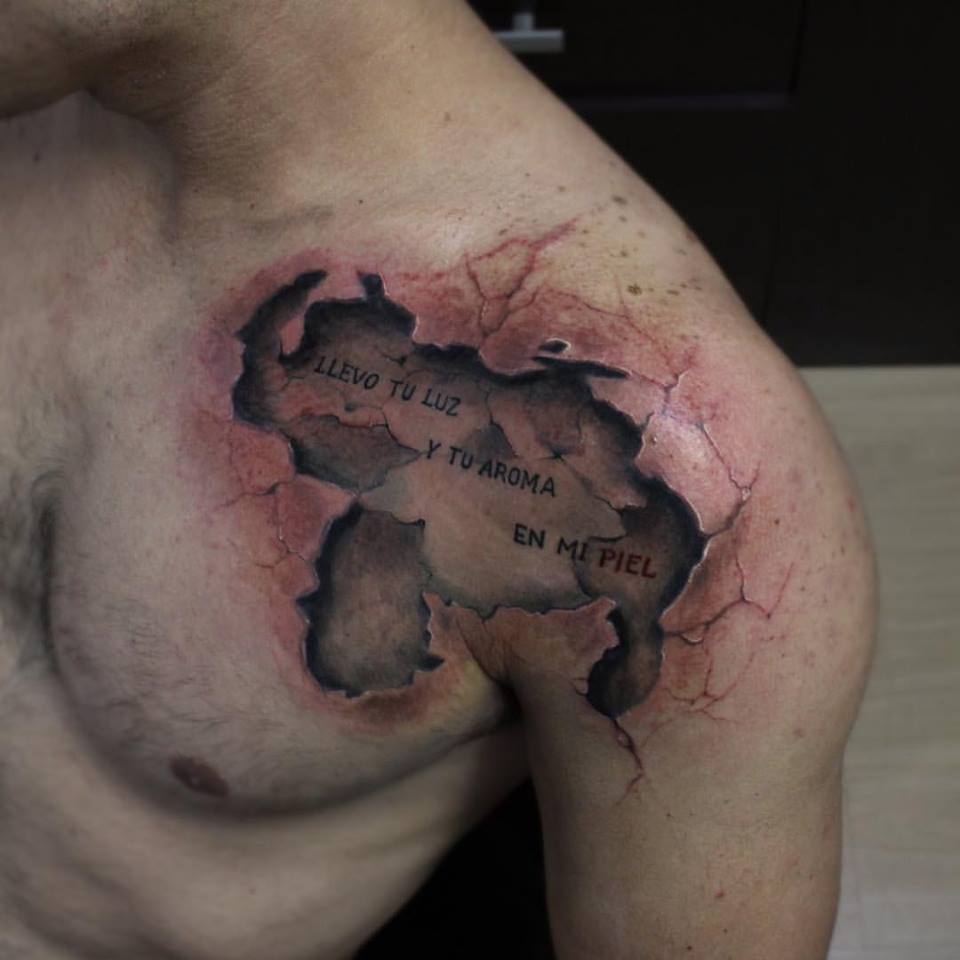 Cracked Skin Tattoo Left Shoulder by Yomico Moreno