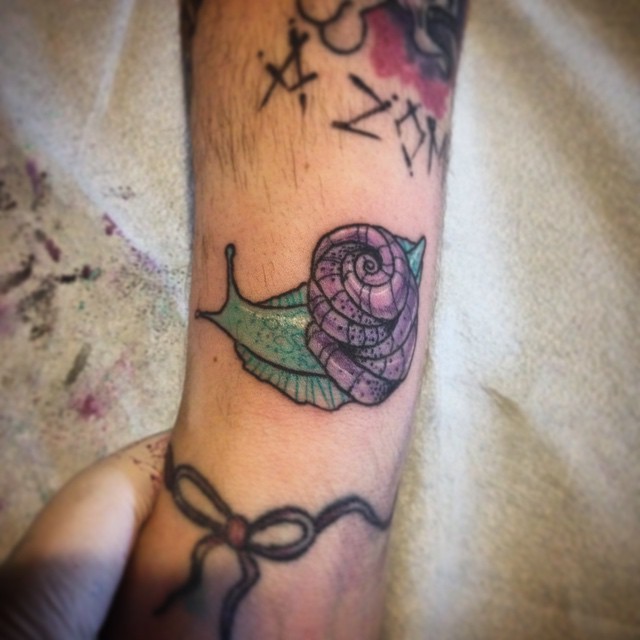 Cute And Small Snail Traditional Tattoo