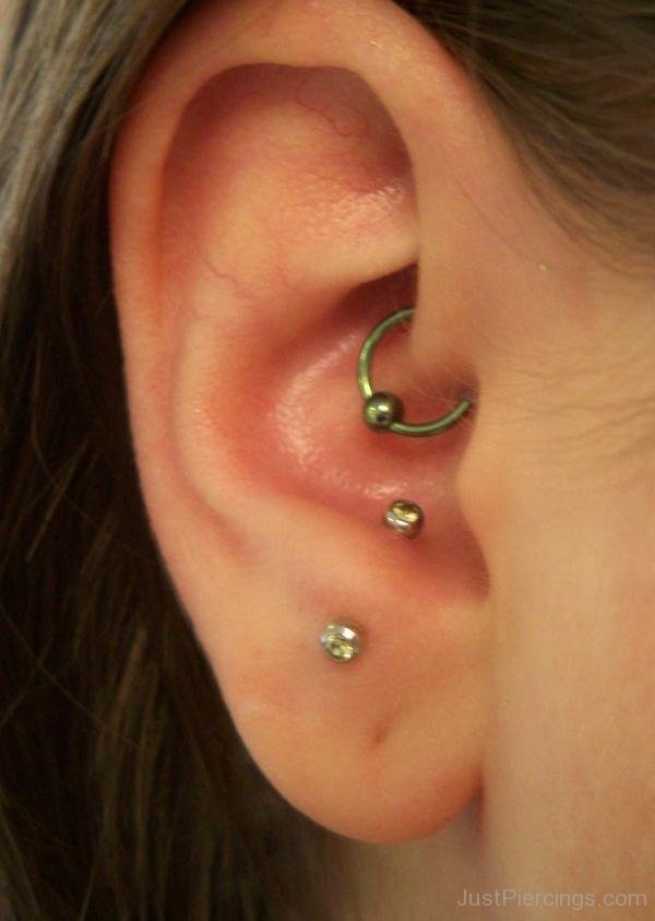 Daith Piercing With Green Hoop Ring