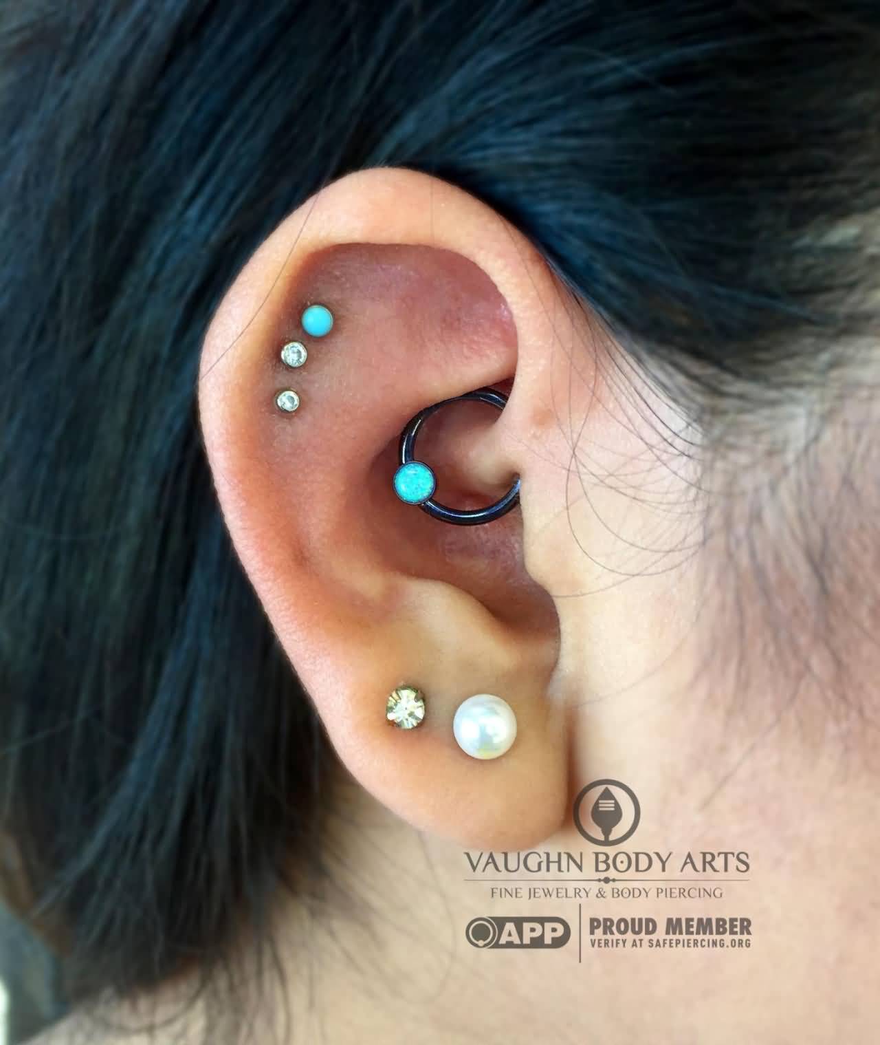 Double Lobes And Blue Bead Ring Daith Piercing