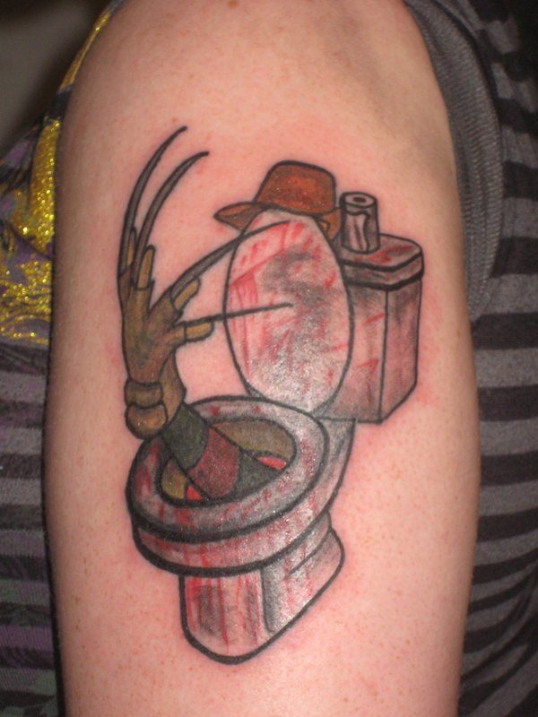 Funny Freddy Krueger In Toilet Traditional Tattoo On Left Shoulder