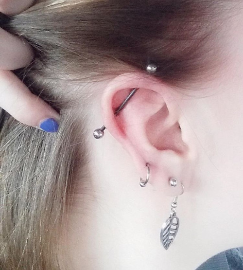 Girl Right Ear Dual Lobe And Industrial Piercing