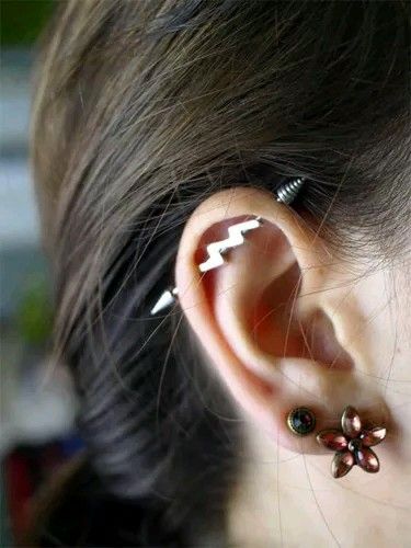 Girl With Spike Barbell Right Ear Industrial Piercing And Dual Lobe Piercing