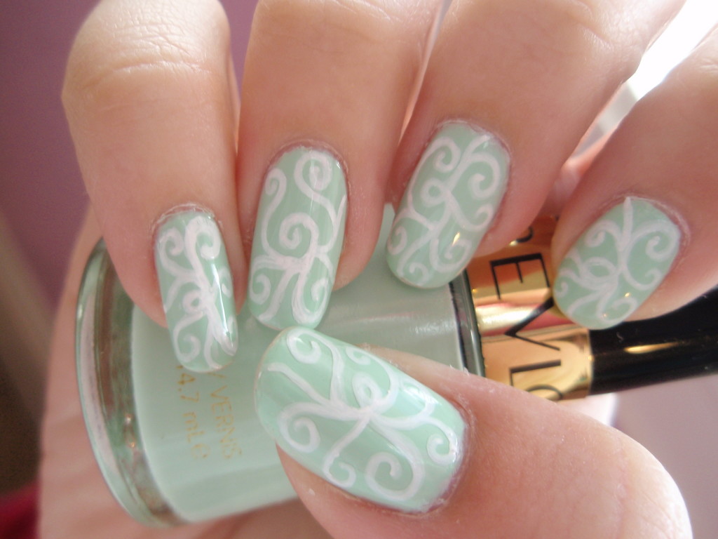 Green Nails With White Spiral Design Winter Nail Art