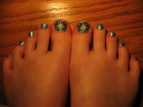 Green Toe Nails With Snowflakes Design Ideas
