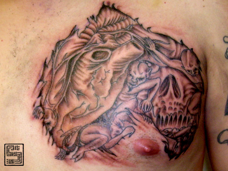 Grey And Black Skull With Demon And Heart Tattoo On Left Chest