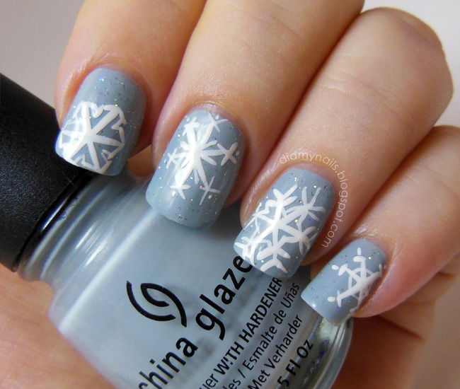 Grey Base Nails With White Snowflakes Winter Nail Art