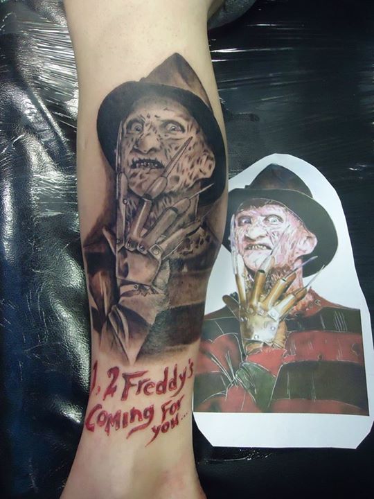 Grey Color Freddy Krueger Portrait Tattoo On Leg