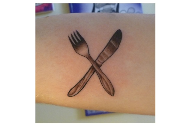 Grey Crossed Fork And Knife Tattoo Design