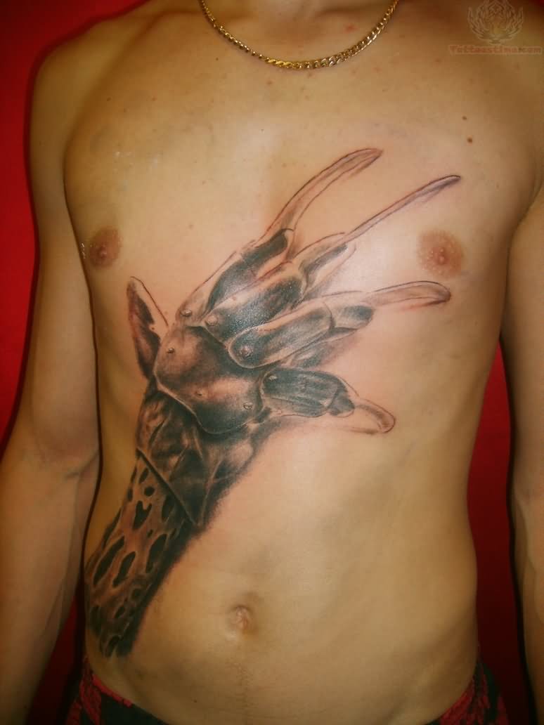 Grey Ink 3D Freddy Krueger Glove Tattoo On Chest And Stomach
