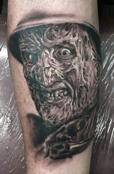 Grey Ink Freddy Krueger Head Tattoo