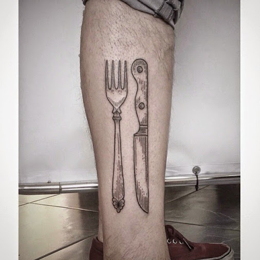 Grey Ink Knife With Fork Tattoo On Leg By Virginia