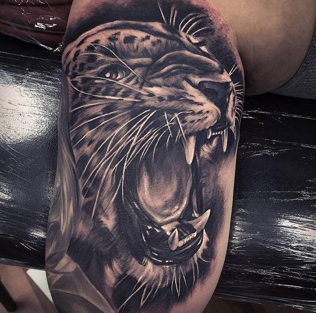 Grey Ink Realistic Angry Jaguar Head Tattoo By Fred Flores