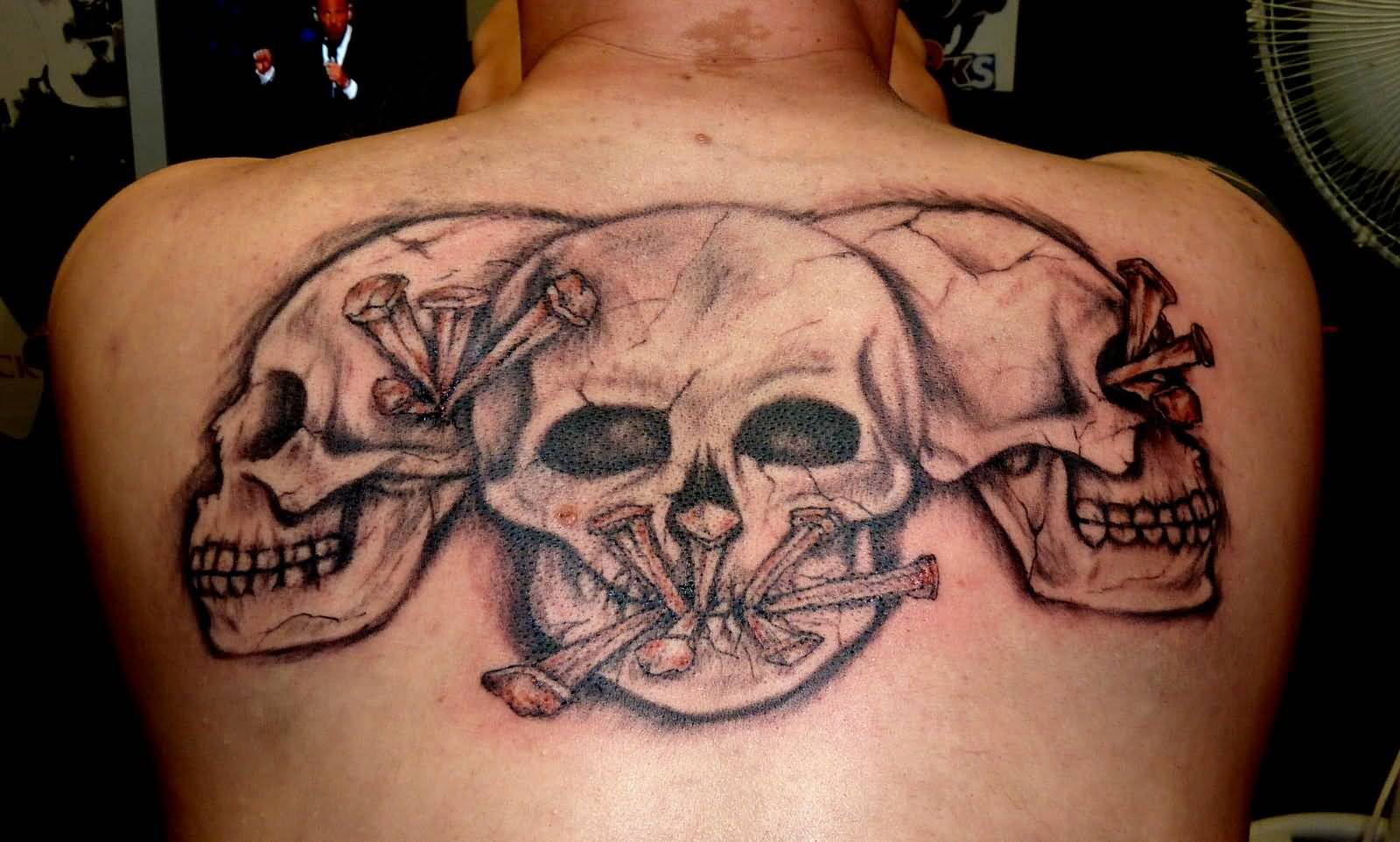 Grey Ink See No Evil Skulls Tattoo On Full Back
