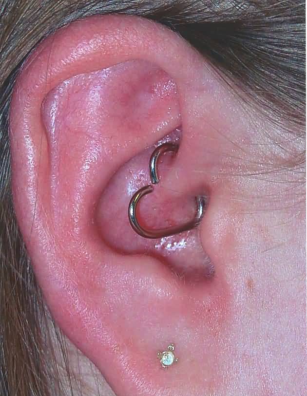 Heart Ring Daith Piercing On Girl Right Ear