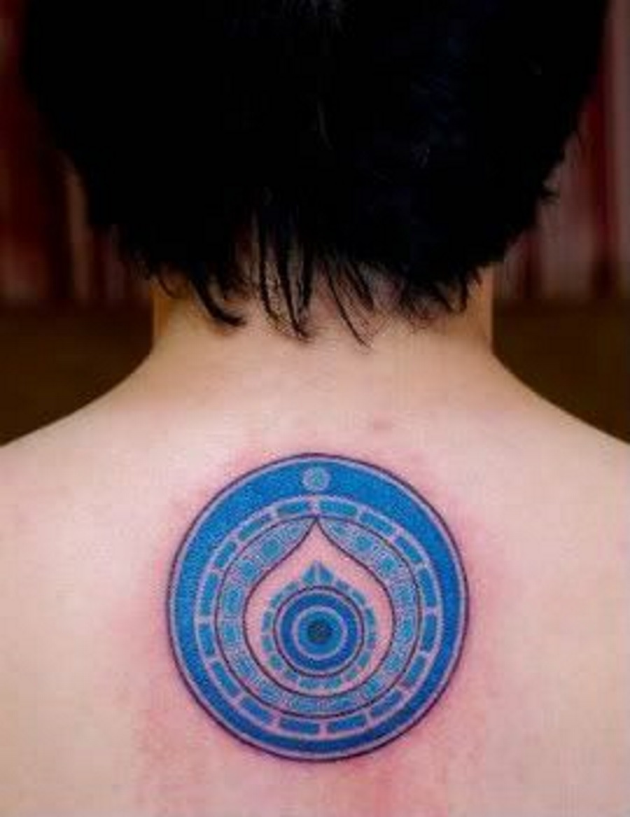 Impressive Evil Eye In Blue Circle Tattoo On Upper Back