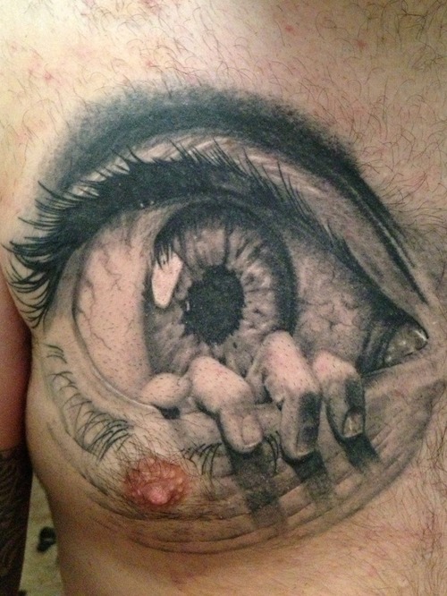 Incredible Grey 3D Hand Coming Out Of Large Eye Tattoo On Chest