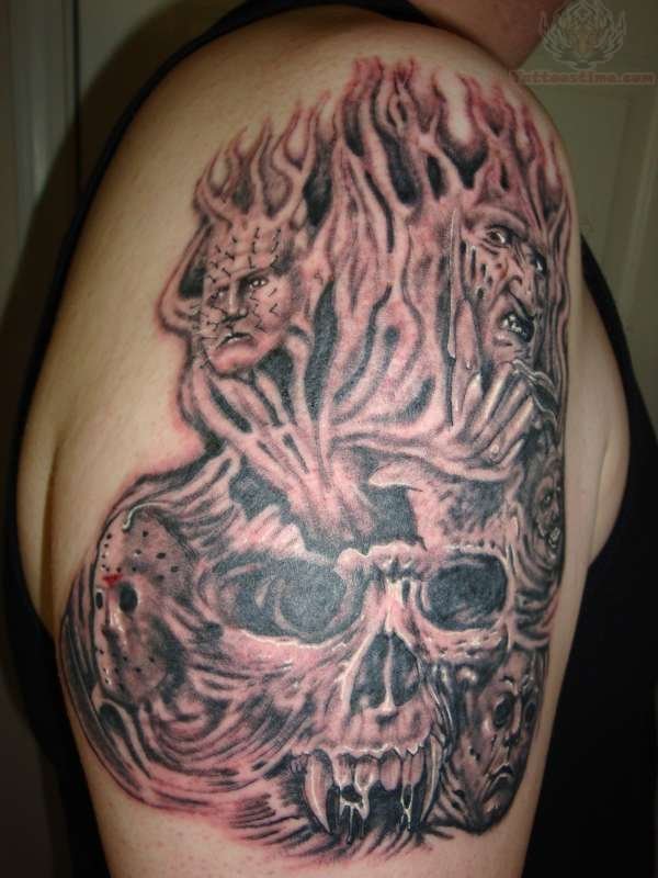 Incredible Grey Ink Flaming Skull With Jason And Freddy Krueger Tattoo On Right Shoulder