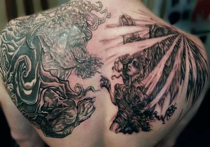 Incredible Grey Ink Good Vs Evil Tattoo On Upper Back