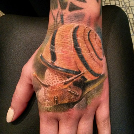Incredible Snail Tattoo On Left Hand