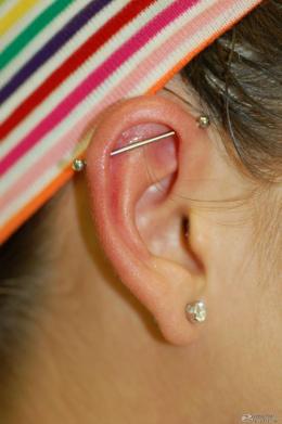 Industrial Piercing With Gold Barbell