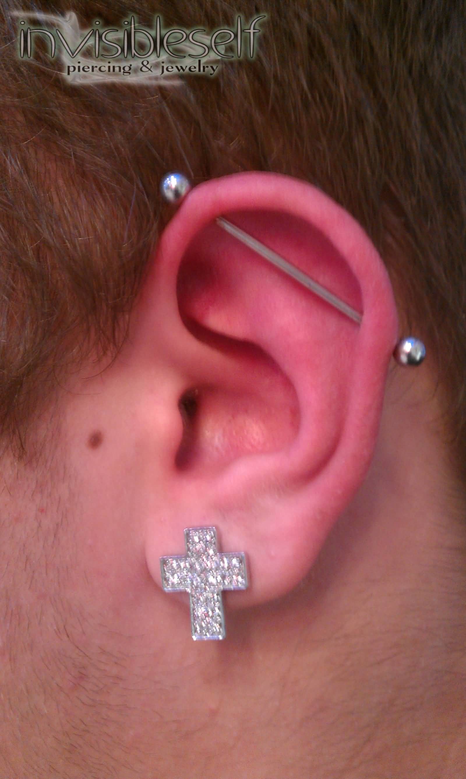 Left Ear Cross And Industrial Piercing Picture