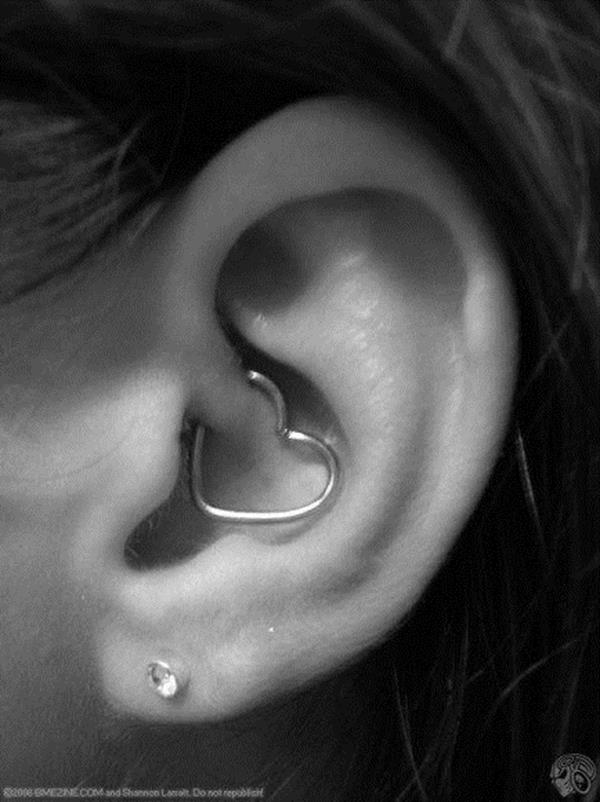 Left Ear Daith Piercing With Heart Ring