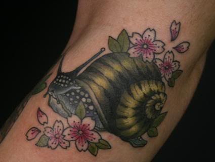 Lovely Color Ink Snail With Flowers Tattoo