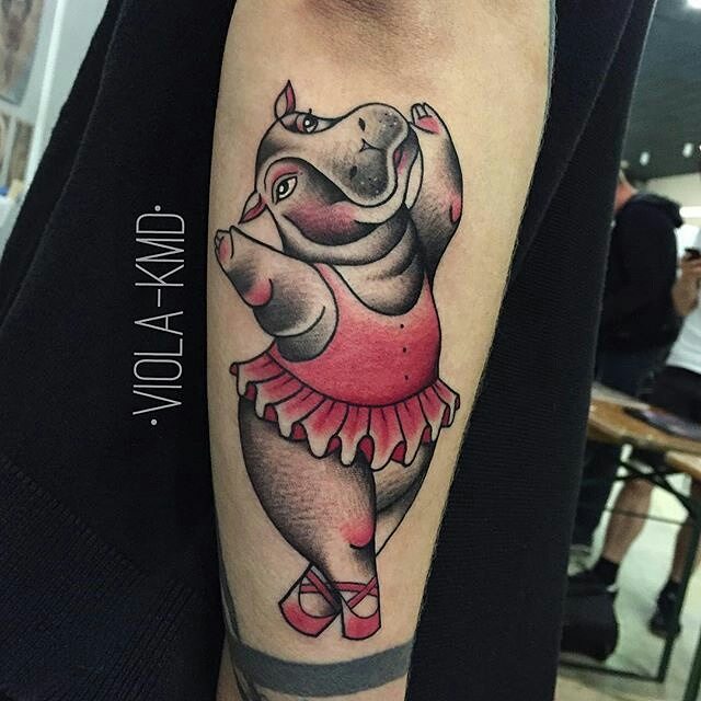 Lovely Dancing Hippo Traditional Tattoo On Forearm