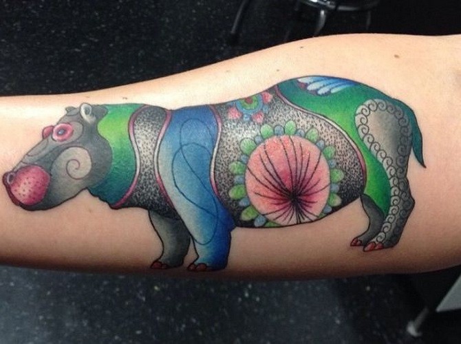 Lovely Vivid Colored Full Size Hippo Tattoo On Forearm