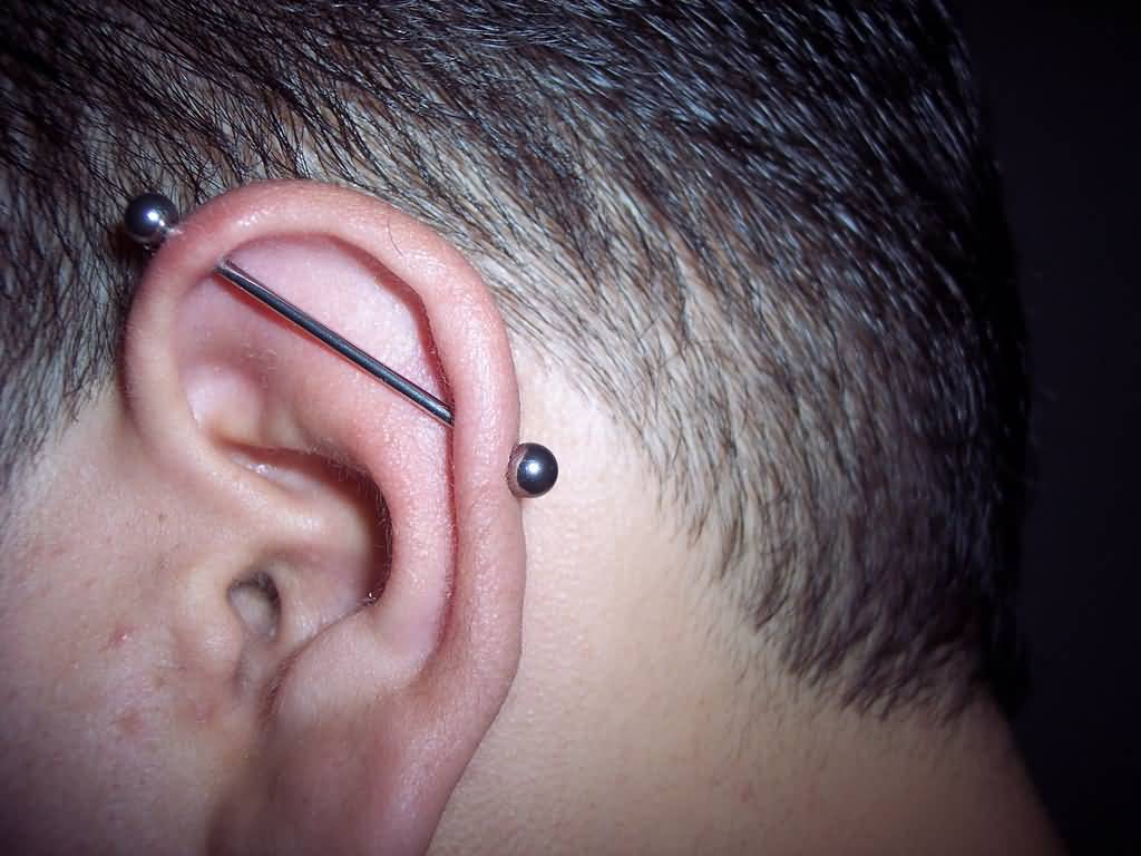 Man Left Ear Industrial Piercing