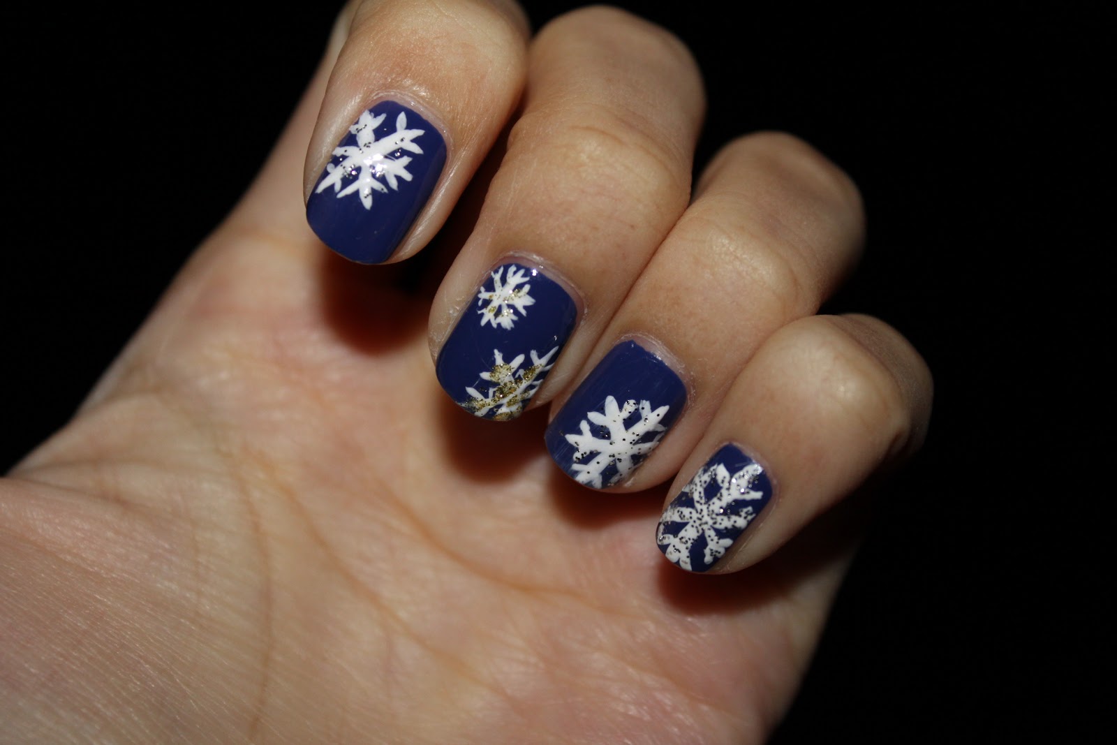 Matte Navy Blue Nails With White Snowflakes Winter Nail Art