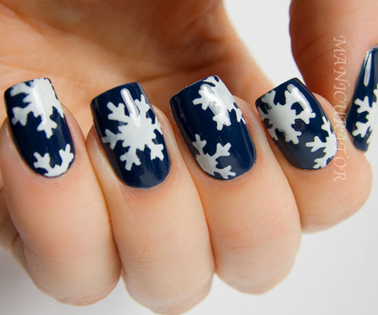 Navy Blue Glossy Nails With White Snowflakes Design Winter Nail Art