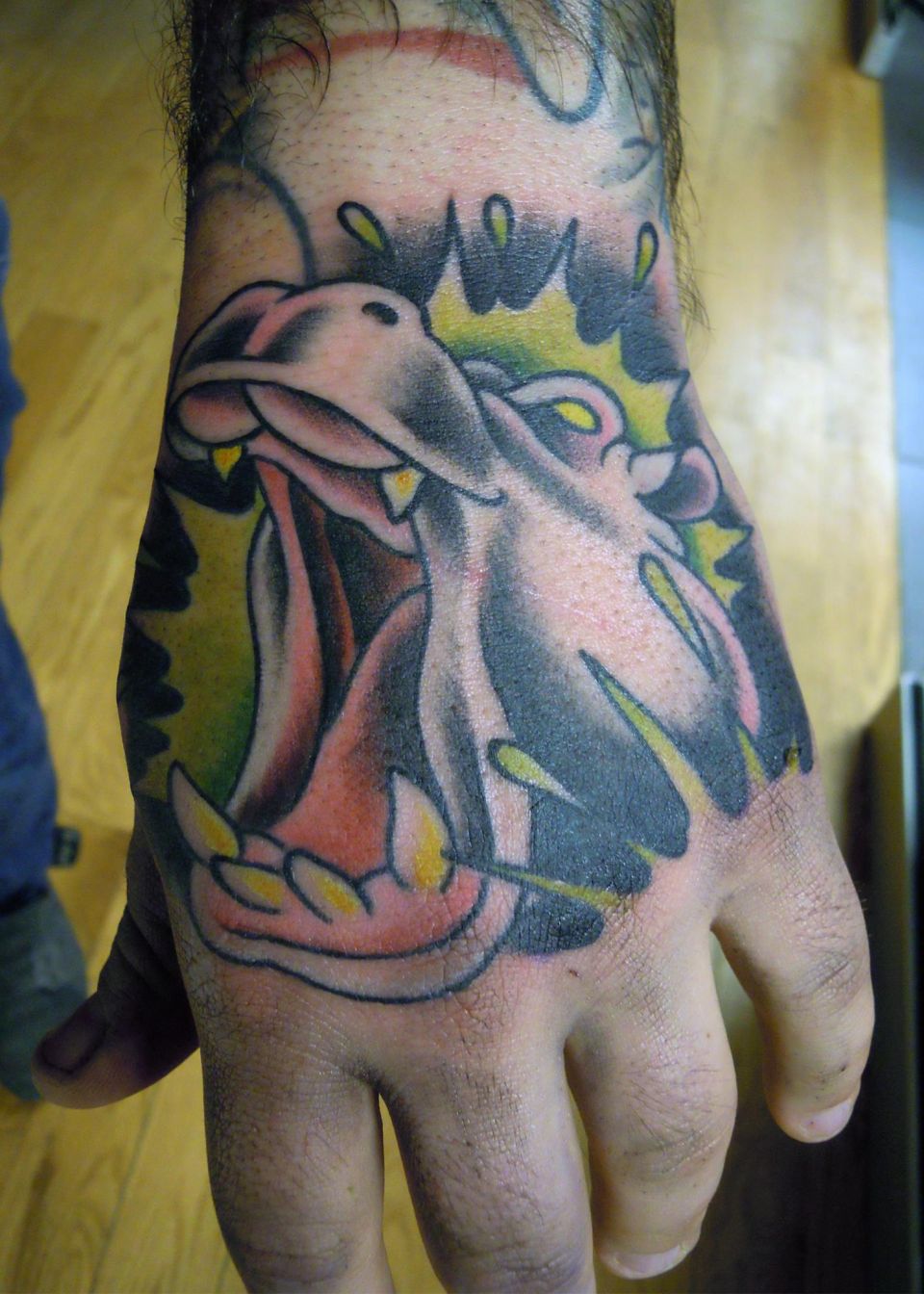 Nice Angry Hippo Head Traditional Tattoo On Hand