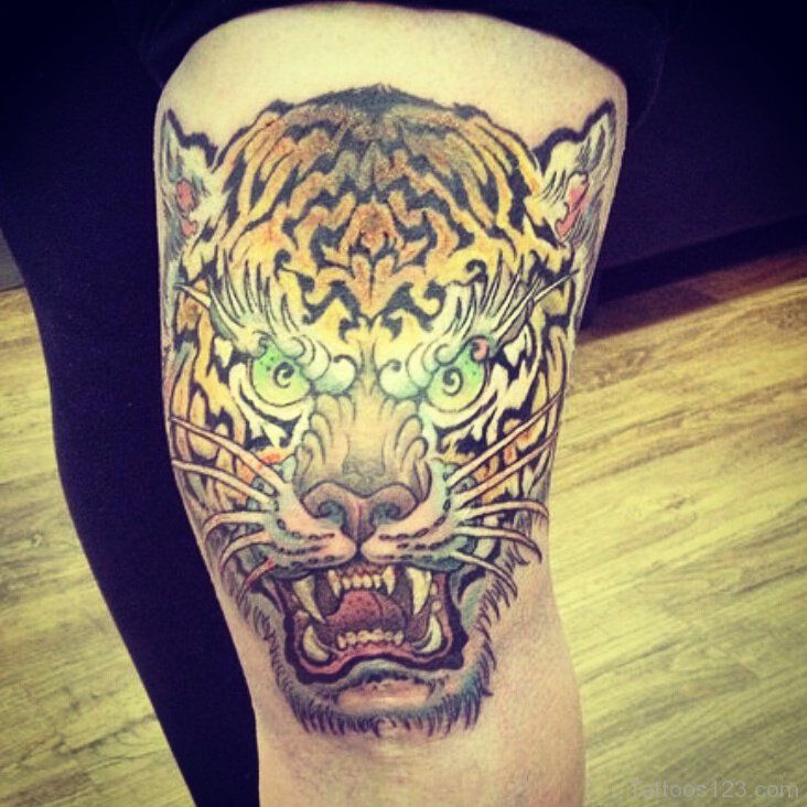 Nice Angry Jaguar Head Tattoo On Thigh