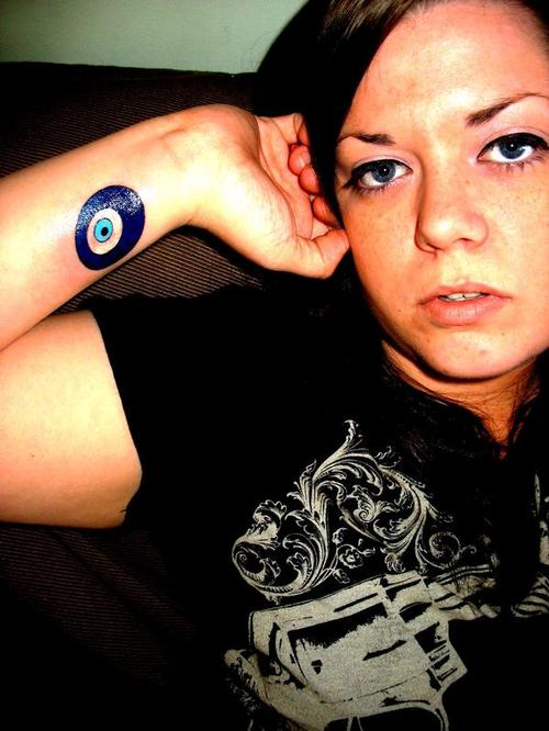 Nice Blue Evil Eye Tattoo On Wrist